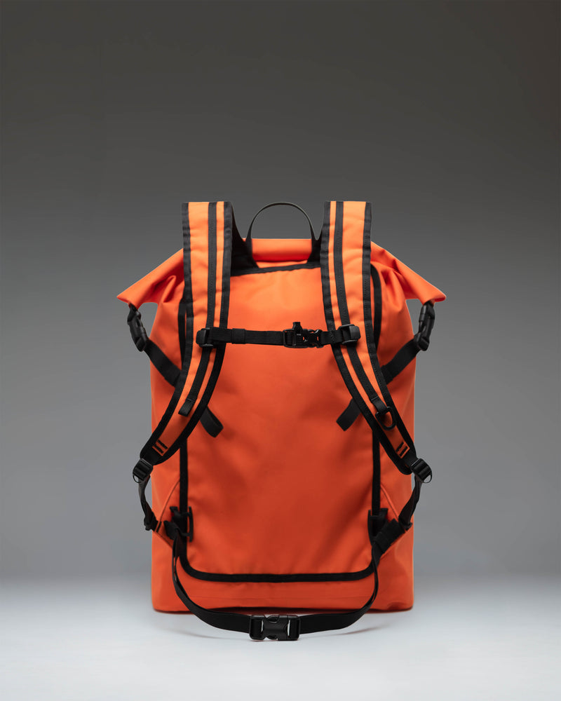 Herschel Supply Co. Dry Bag Backpack 32L in Vermillion Orange, a waterproof roll-top outdoor backpack.