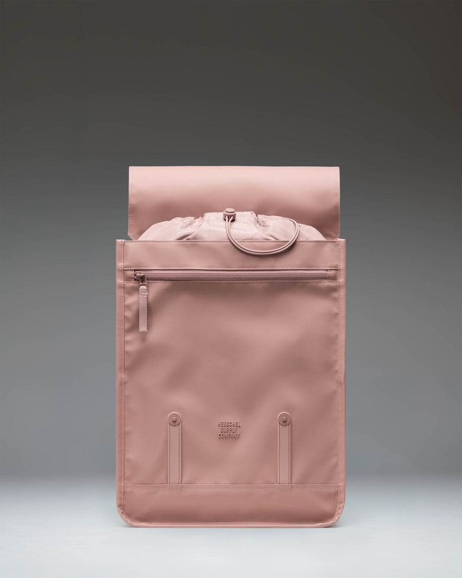 Herschel Survey Backpack in Ash Rose featuring a clean, minimalist design with dual front straps.