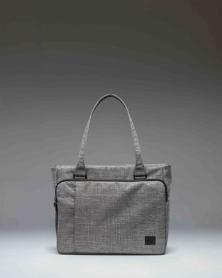 Herschel Supply Co Kaslo Tote Tech in Raven Crosshatch grey, showing the front view with dual top handles and a clean, rectangular design.