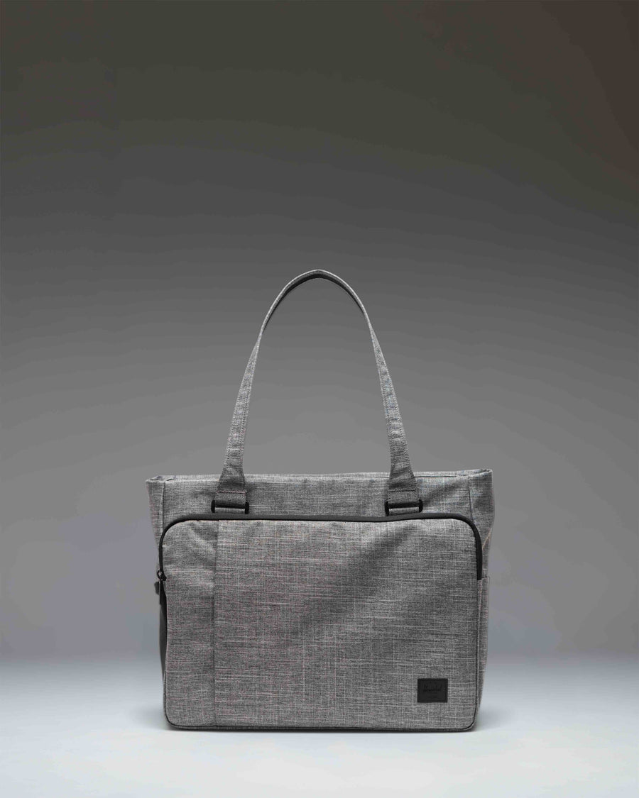 Herschel Supply Co Kaslo Tote Tech in Raven Crosshatch grey, showing the front view with dual top handles and a clean, rectangular design.
