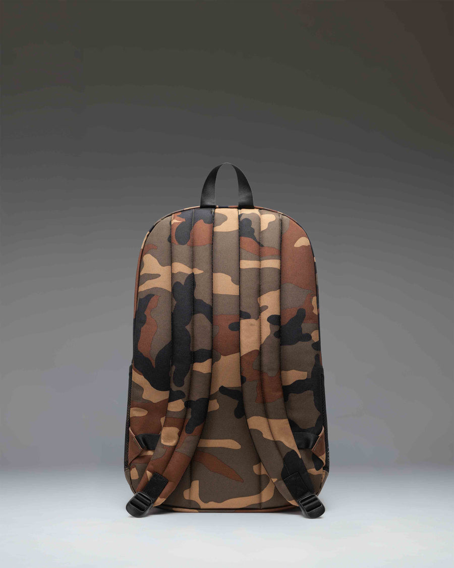 Herschel Supply Co. Fleet Skate Backpack in Woodland Camo/Black featuring functional skate straps on the front.