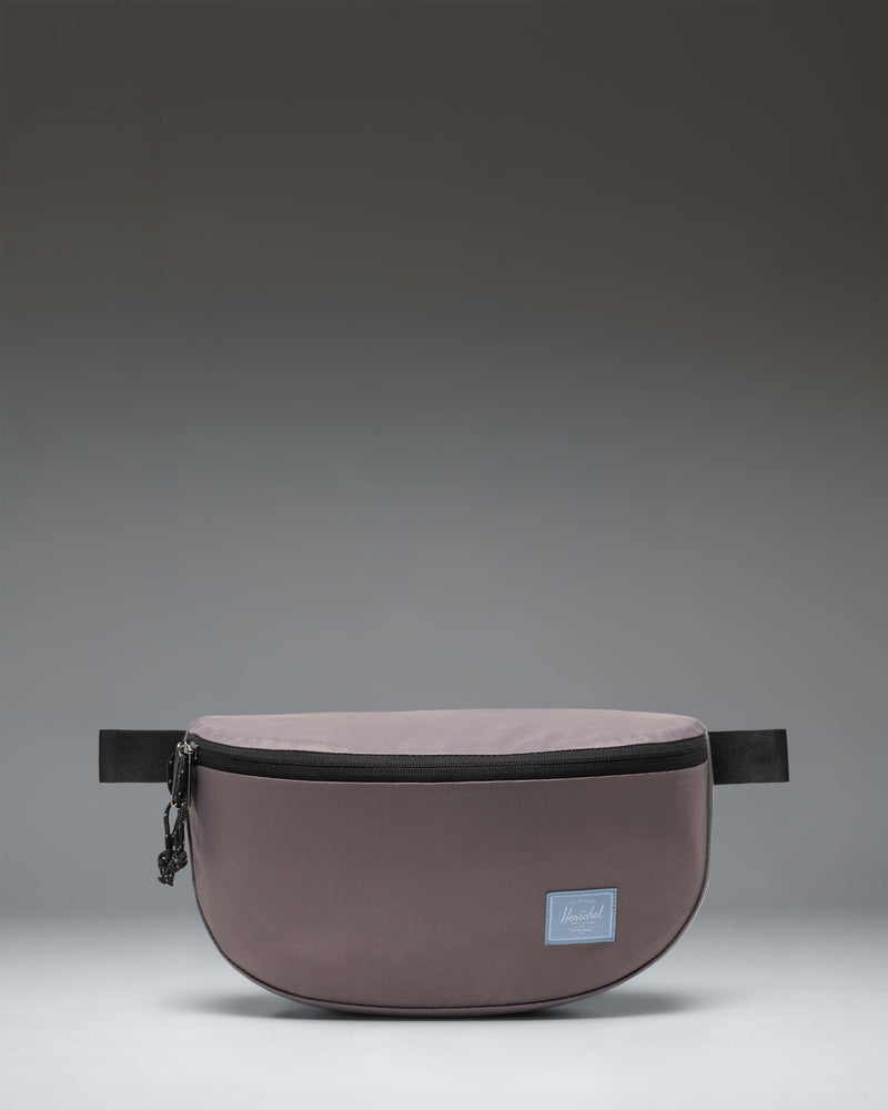 Herschel Supply Co. Kaine Hip Pack in Dark Gull Gray, a versatile and durable waist bag designed for everyday use and travel convenience.