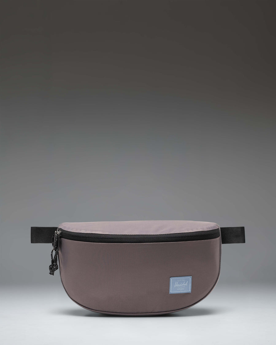Herschel Supply Co. Kaine Hip Pack in Dark Gull Gray, a versatile and durable waist bag designed for everyday use and travel convenience.