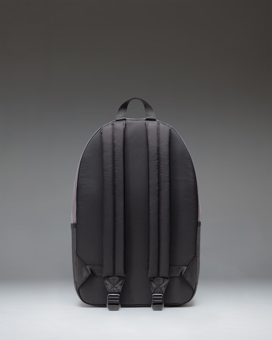 Herschel Supply Co. Kaine Backpack in Dark Gull Gray, featuring a spacious main compartment, utility pockets, and ergonomic shoulder straps.