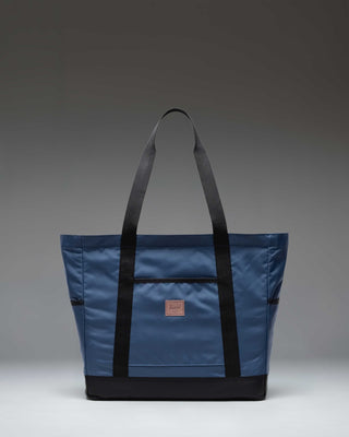 Herschel Heritage Tote bag in Oceana blue, featuring a classic design with dual carry handles and the signature Herschel woven label.