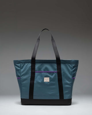 Herschel Supply Co. Heritage Tote bag in Mediterranea blue, featuring a classic rectangular shape and top webbing handles.