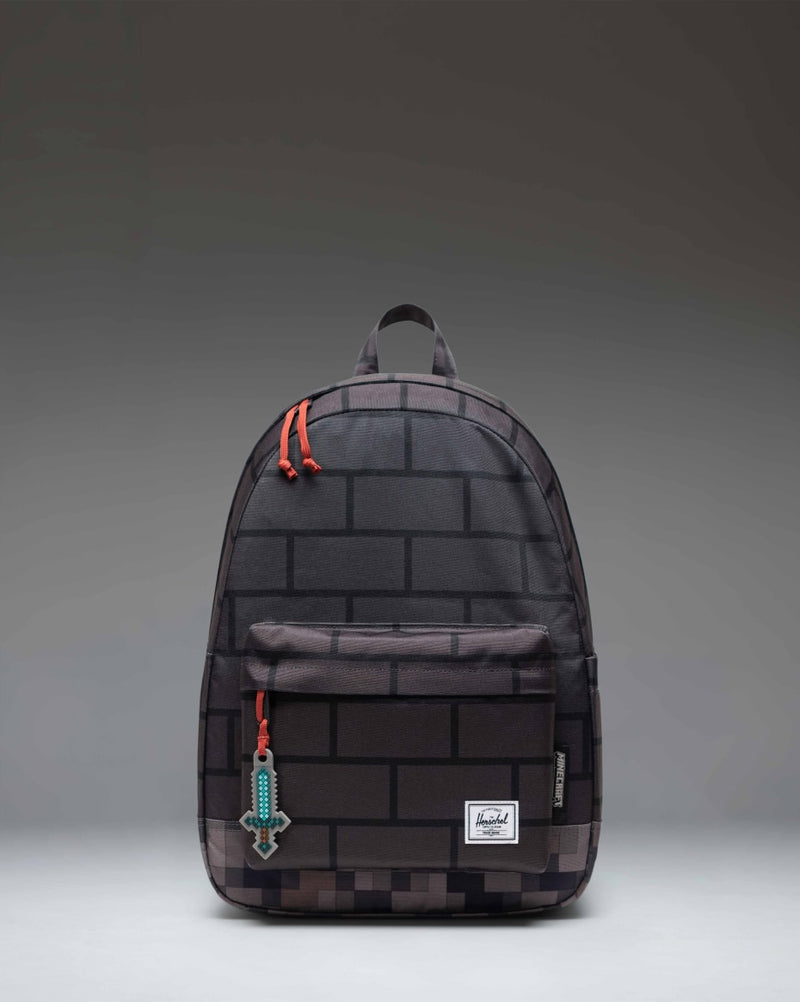 Minecraft Herschel Classic Backpack in The Nether colorway, featuring a black pixelated design with red accents.