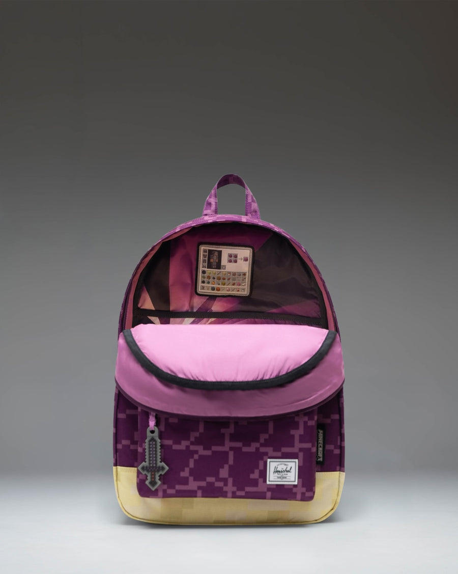Minecraft Herschel Classic Backpack in The End colorway featuring a dark purple pattern inspired by the Minecraft dimension.