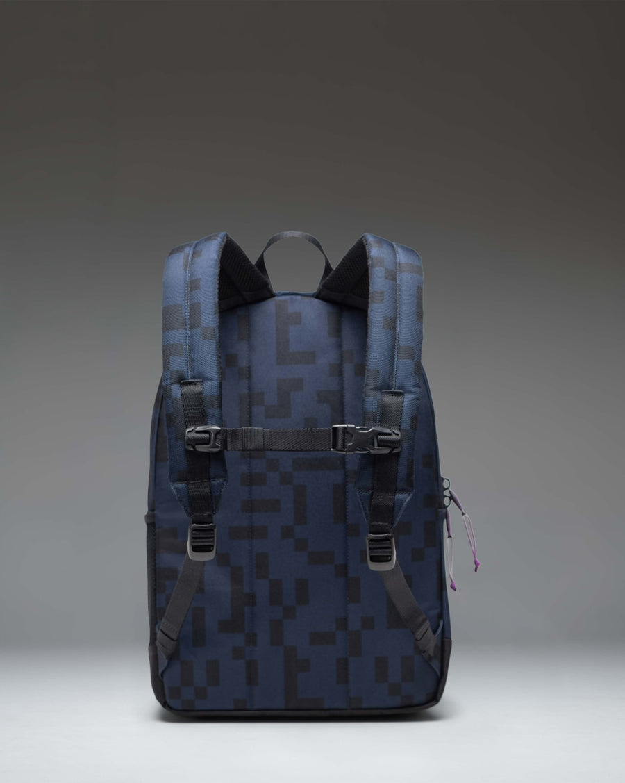 Minecraft Herschel Heritage Youth Backpack in the Enderman color pattern featuring a black exterior with purple and gray pixels.