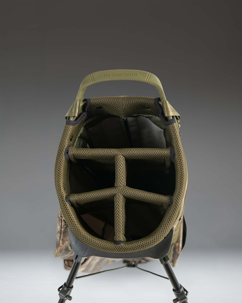 Herschel Watt Stand Bag in Realtree APX Camo.