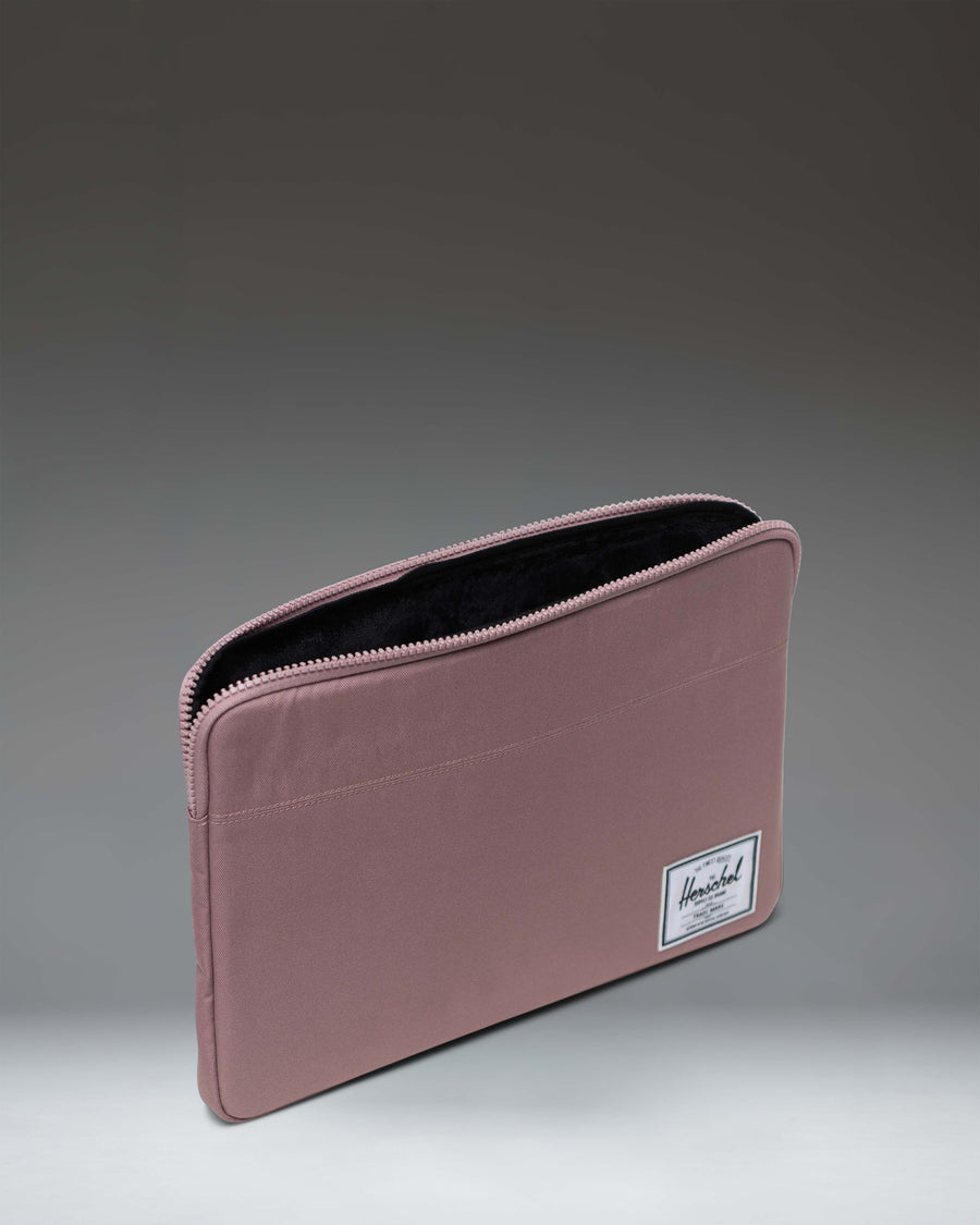 Herschel Supply Co. Anchor 15-16 Inch Sleeve in Ash Rose, a minimalist laptop case featuring a clean, soft pink protective exterior.