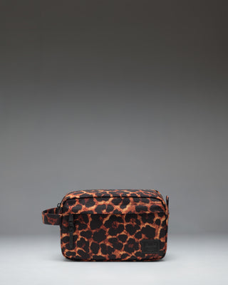 Herschel Supply Co. Chapter Travel Kit in Digi Leopard print, featuring a black leopard spot pattern on a grey background.