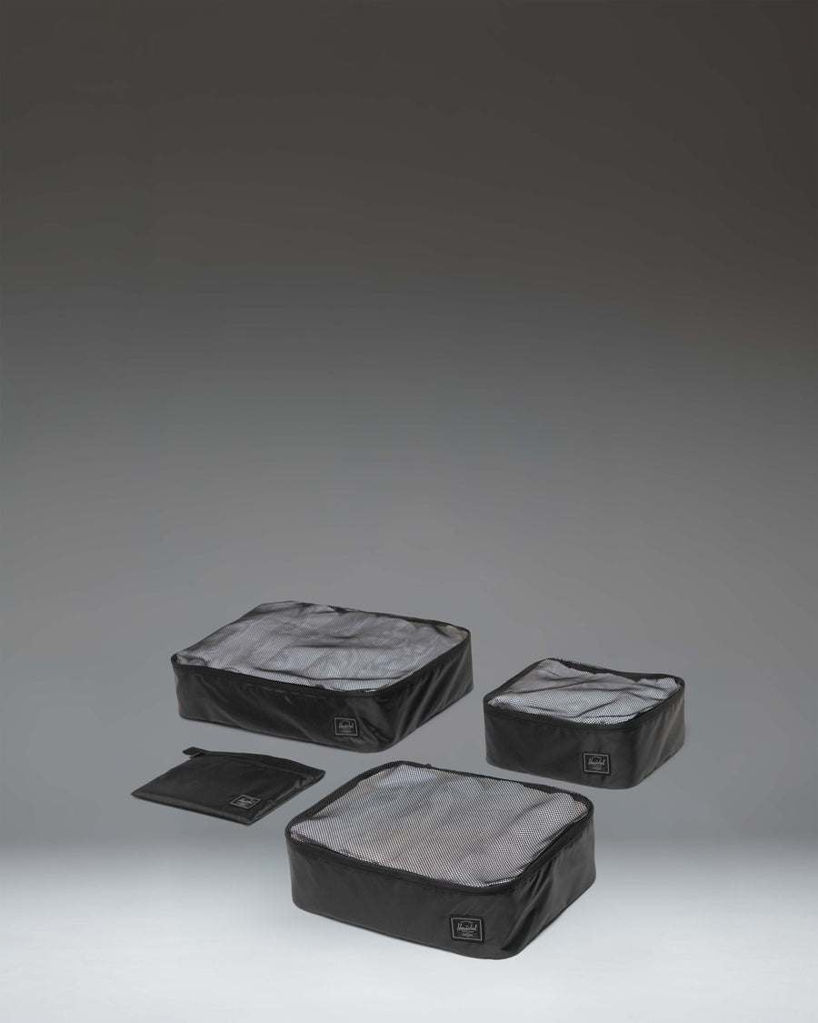 Herschel Supply Co Kyoto Packing Cubes in Black Tonal, showing the set of travel organizers.