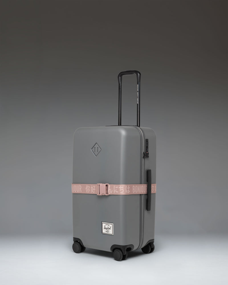 Herschel Supply Co. Luggage Belt in Ash Rose pink.