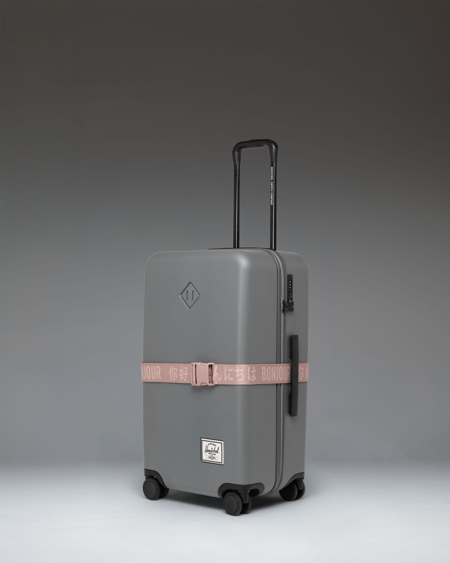 Herschel Supply Co. Luggage Belt in Ash Rose pink.