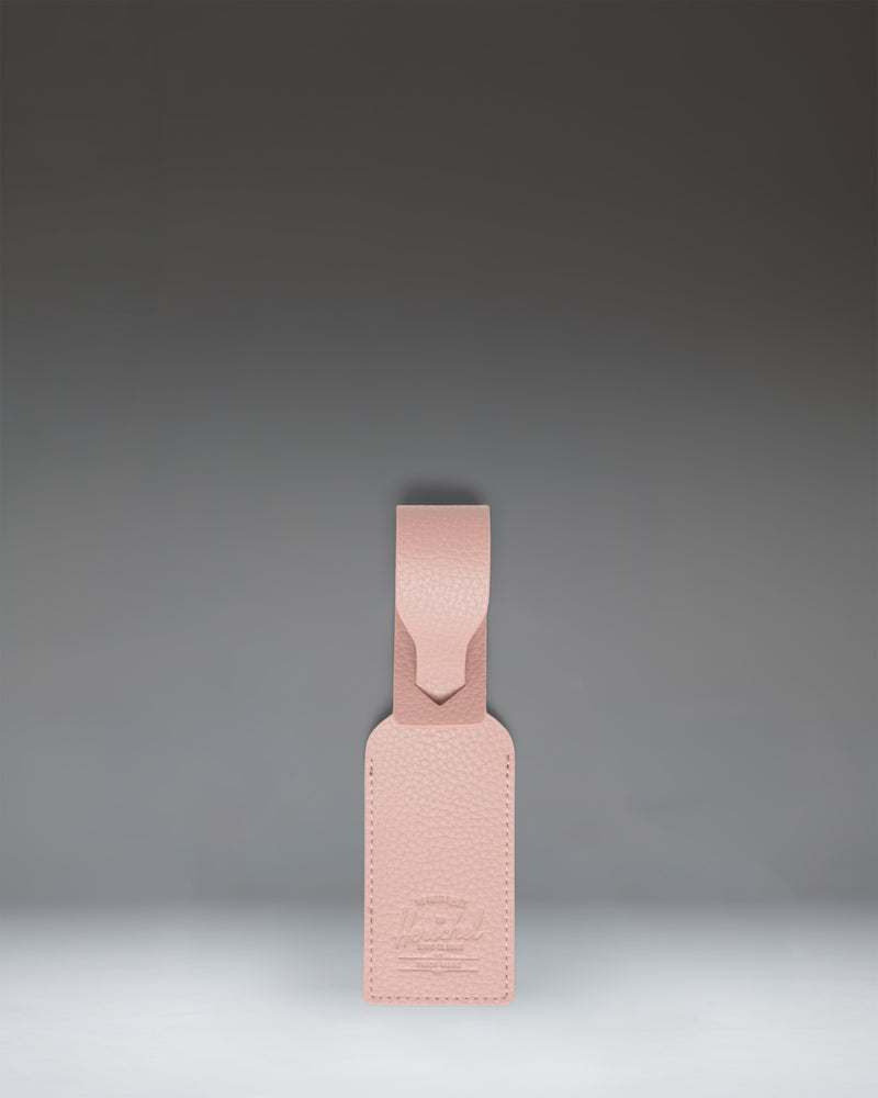 Herschel Supply Co. Vegan Leather Luggage Tag in Ash Rose pink.
