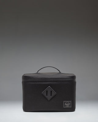 Black Herschel Heritage Lunch Box featuring a zippered front pocket and classic Herschel woven label.