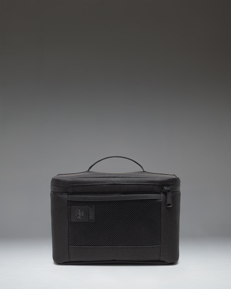 Herschel Heritage Lunch Box in Black Tonal showing the insulated main compartment interior.