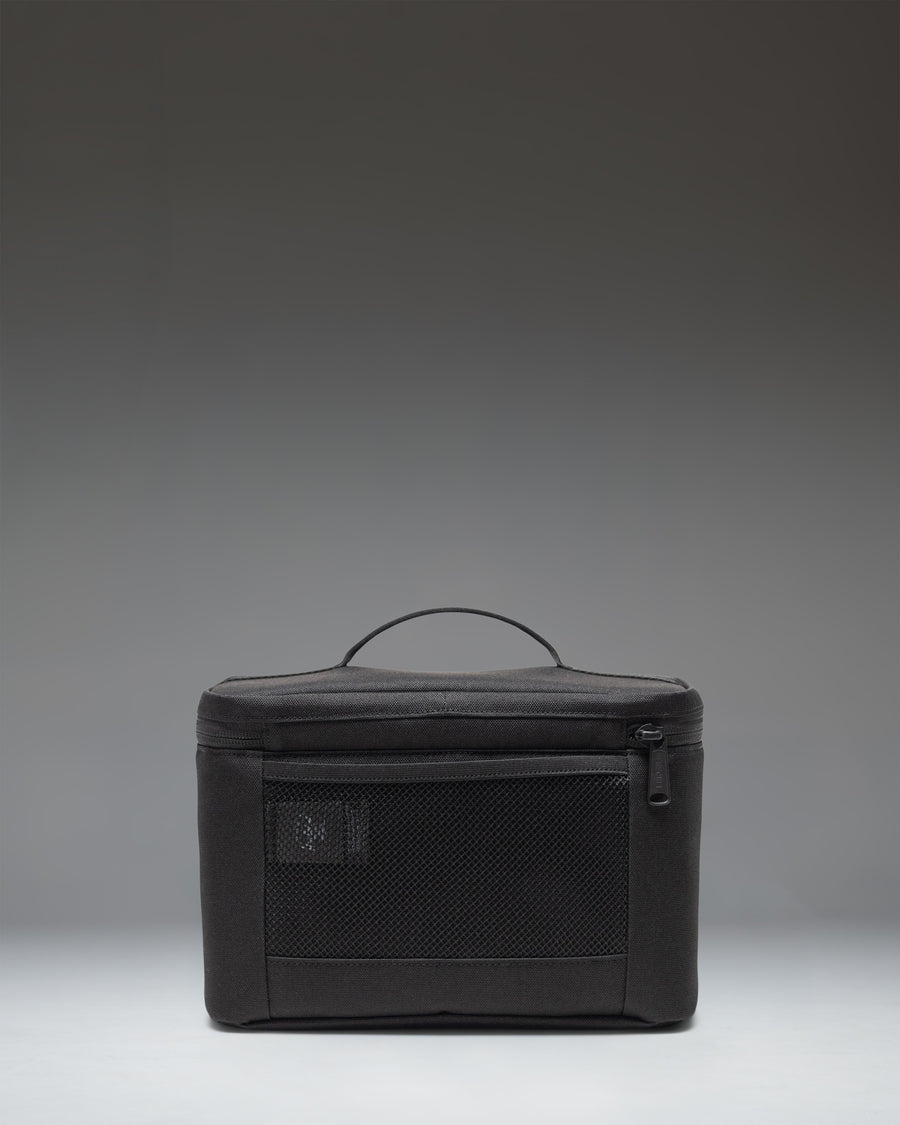 Herschel Heritage Lunch Box in Black Tonal showing the insulated main compartment interior.
