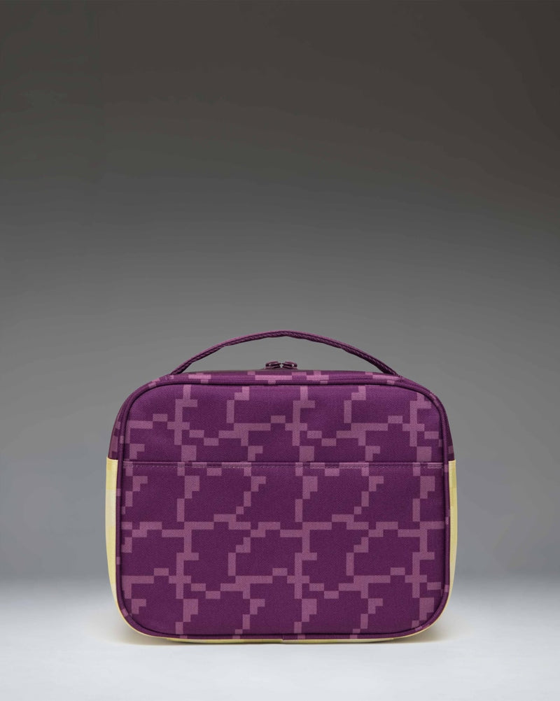 Herschel Supply Co. Minecraft Pop Quiz Lunch Box in The End colorway, showing the interior insulated lining and mesh pocket.