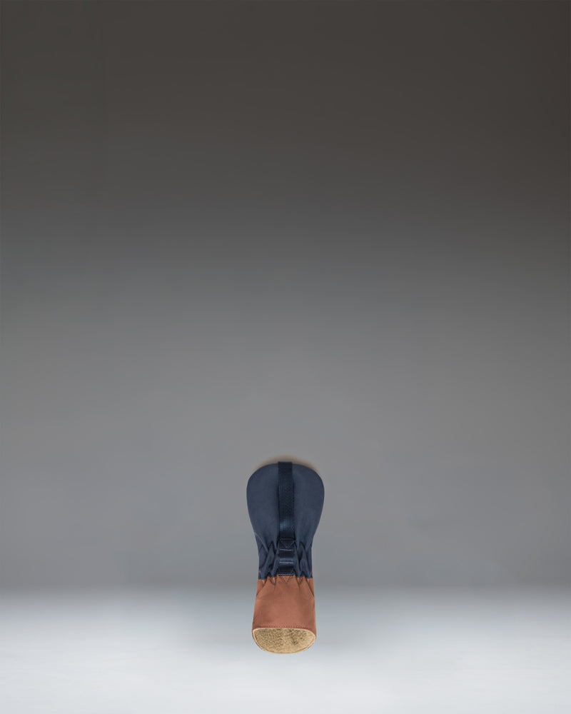 Herschel Heritage Hybrid Head Cover in Navy/Saddle Brown, featuring a classic design with a rubber diamond detail on top.