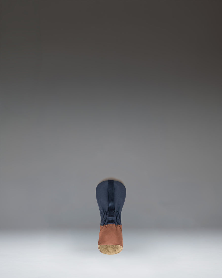 Herschel Heritage Hybrid Head Cover in Navy/Saddle Brown, featuring a classic design with a rubber diamond detail on top.