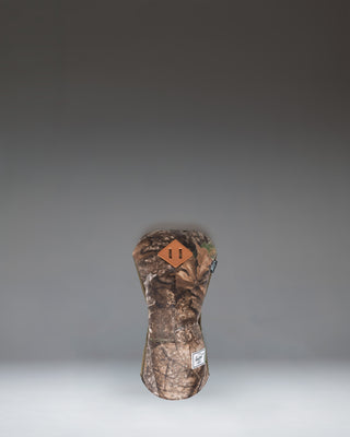Herschel Heritage Driver Head Cover in Realtree APX Camo pattern featuring a classic design with a diamond accent patch.