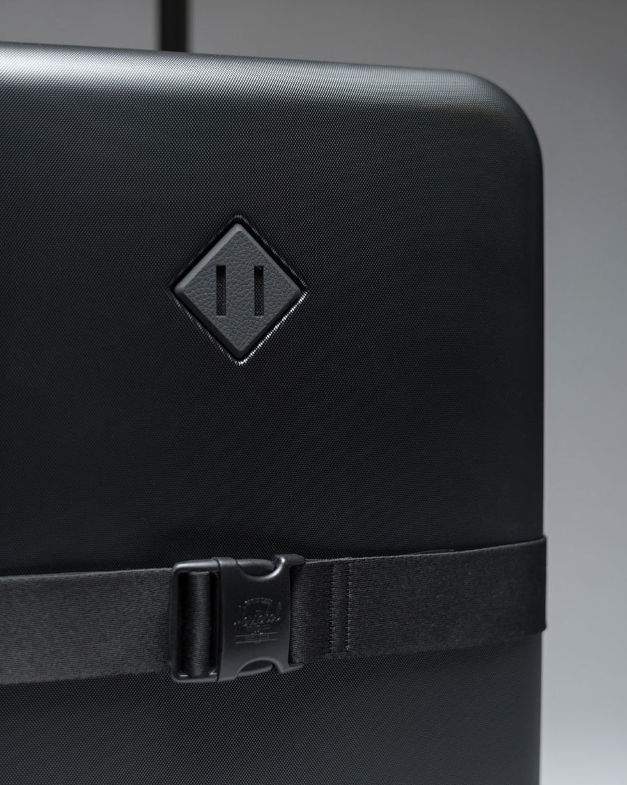Herschel Heritage Hardshell Medium Luggage Exp showing all color options available.