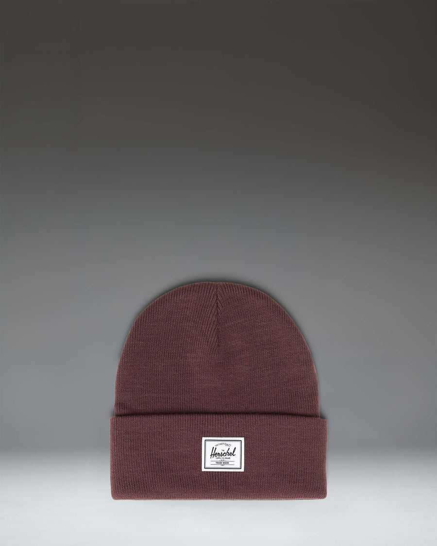 Herschel Supply Co. Elmer Beanie in Huckleberry, a classic knit cuff beanie in a deep purple colorway with a woven classic logo label on the cuff.