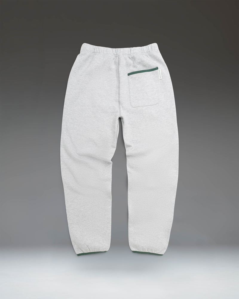Women's Herschel Supply Co Performance Sweatpants in Heather Light Grey, highlighting the size guide chart with measurements for all sizes.