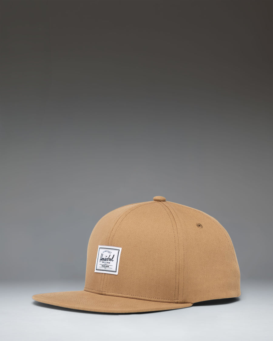 Herschel Supply Co. Whaler 6 Panel Cap in Antique Bronze, a structured mid-profile snapback hat.