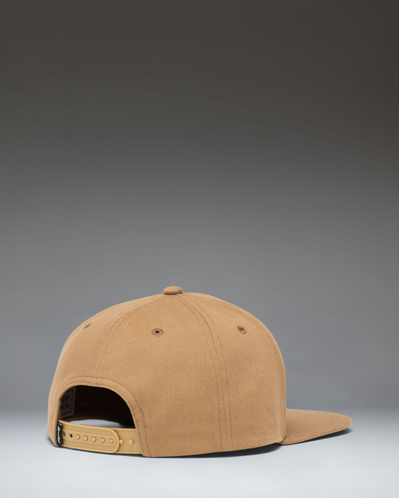 Herschel Supply Co Whaler 6 Panel Cap in Antique Bronze, showing the front view of the structured crown and flat brim.