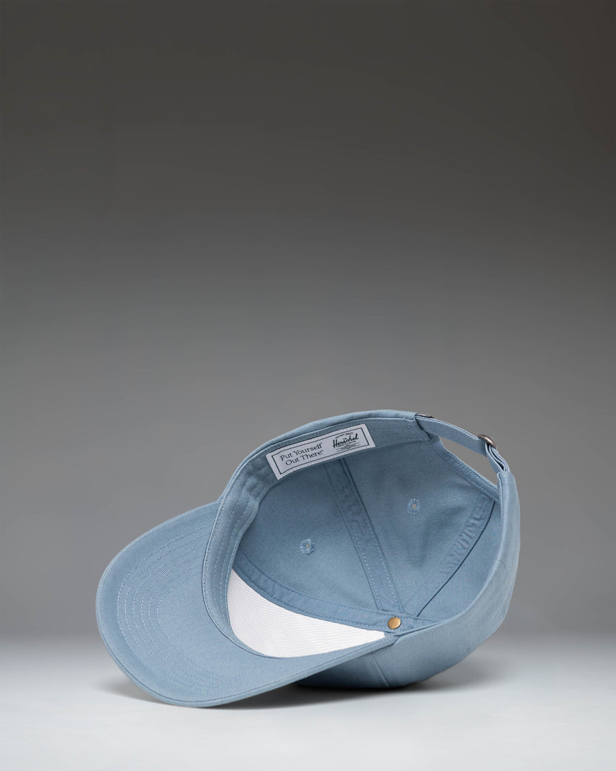 Herschel Supply Co. Sylas Classic Cap in Windward Blue, featuring an adjustable strap and classic six-panel baseball hat design.