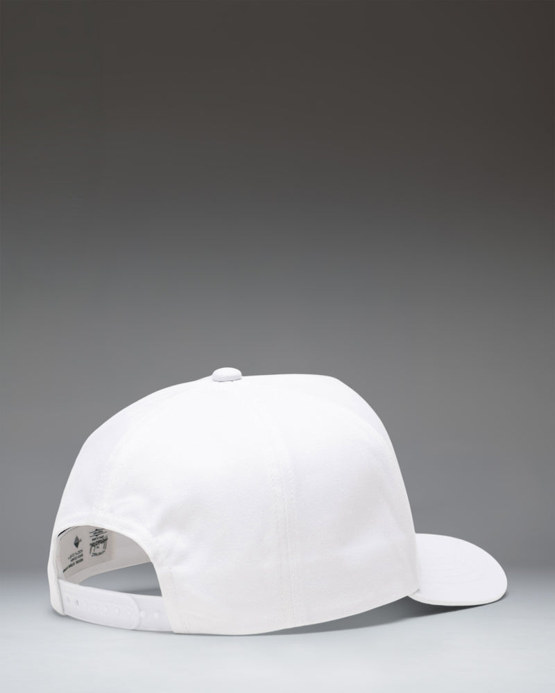 Herschel Supply Co Whaler Tall Cotton Paving Cap in white, showing a detailed side view of the adjustable strap and structured crown.