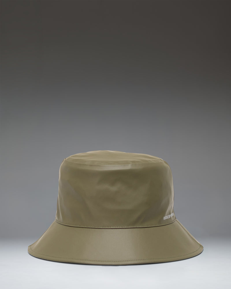 Herschel Supply Co. Norman Rain Bucket Hat in Ivy Green, showcasing a flat lay view of the waterproof fabric and wide brim.