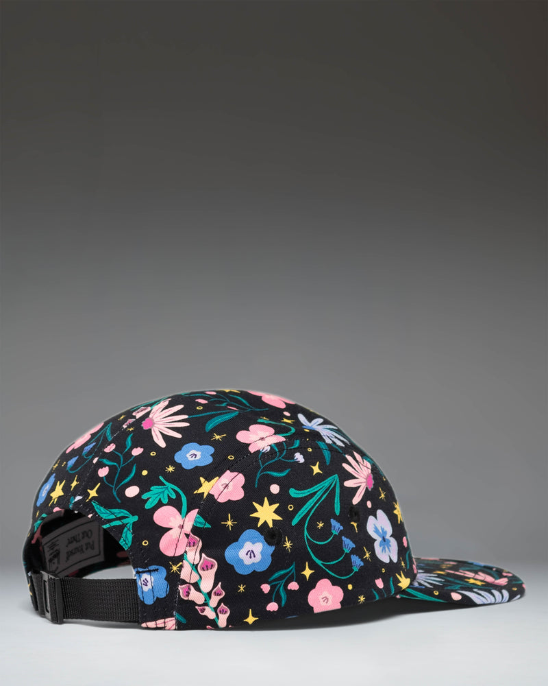 Herschel Supply Co Glendale Kids Cap in Enchanted Garden floral print, featuring a classic five-panel design and adjustable strap.