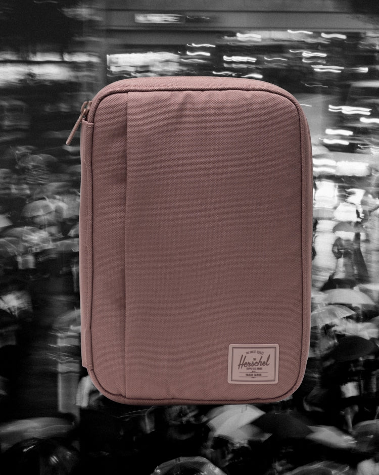 Herschel Supply Co. Burrard Organizer Tech pouch in Ash Rose Tonal pink, showing a compact zippered design for organizing cables and accessories.
