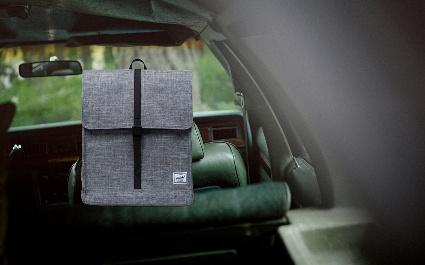 Herschel Supply Co. City Backpack in Raven Crosshatch grey colorways shown from a front perspective on a clean background.