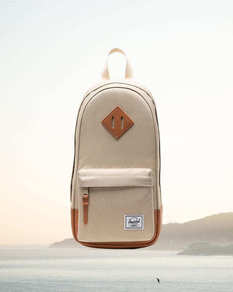 Herschel Heritage Shoulder Bag in Eucalyptus green, shown from the front.