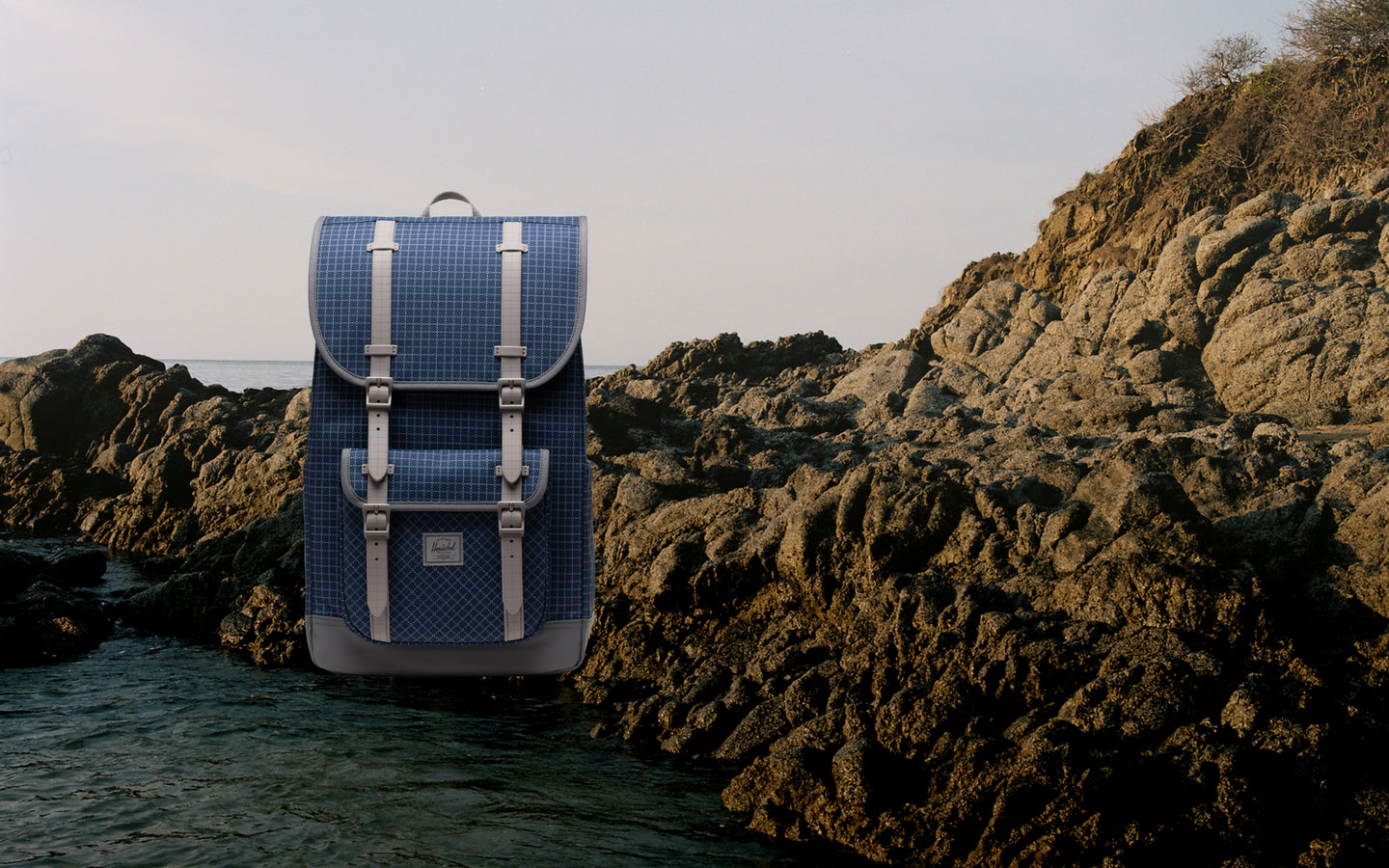 Herschel Supply Co. Little America Backpack in Grid Naval Academy/Magnet pattern.