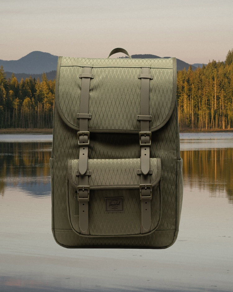 Herschel Supply Co. Little America Mid Backpack in Ivy Green Diamond, shown from the front on a mobile view.