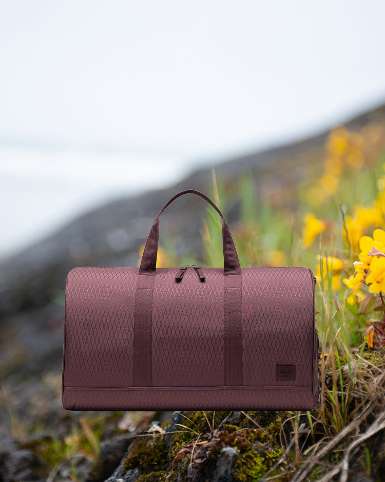 Herschel Supply Co. Novel Duffle bag in Huckleberry Diamond.