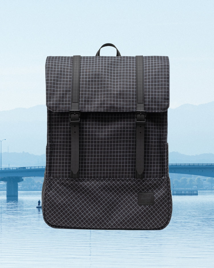 Herschel Supply Co. Survey Backpack in Grid - Black lifestyle view.