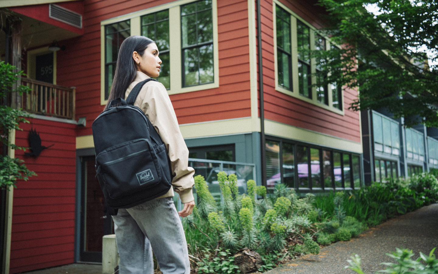 Herschel Supply Co. Pop Quiz Backpack in Black Tonal shown from the front against a plain background.