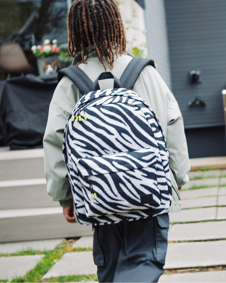 Herschel Classic Backpack in Zebra, featuring a black and white striped pattern.