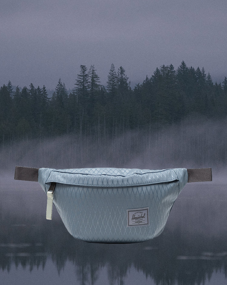 Herschel Classic Hip Pack in Blue Mirage Diamond and Sea Storm blue.