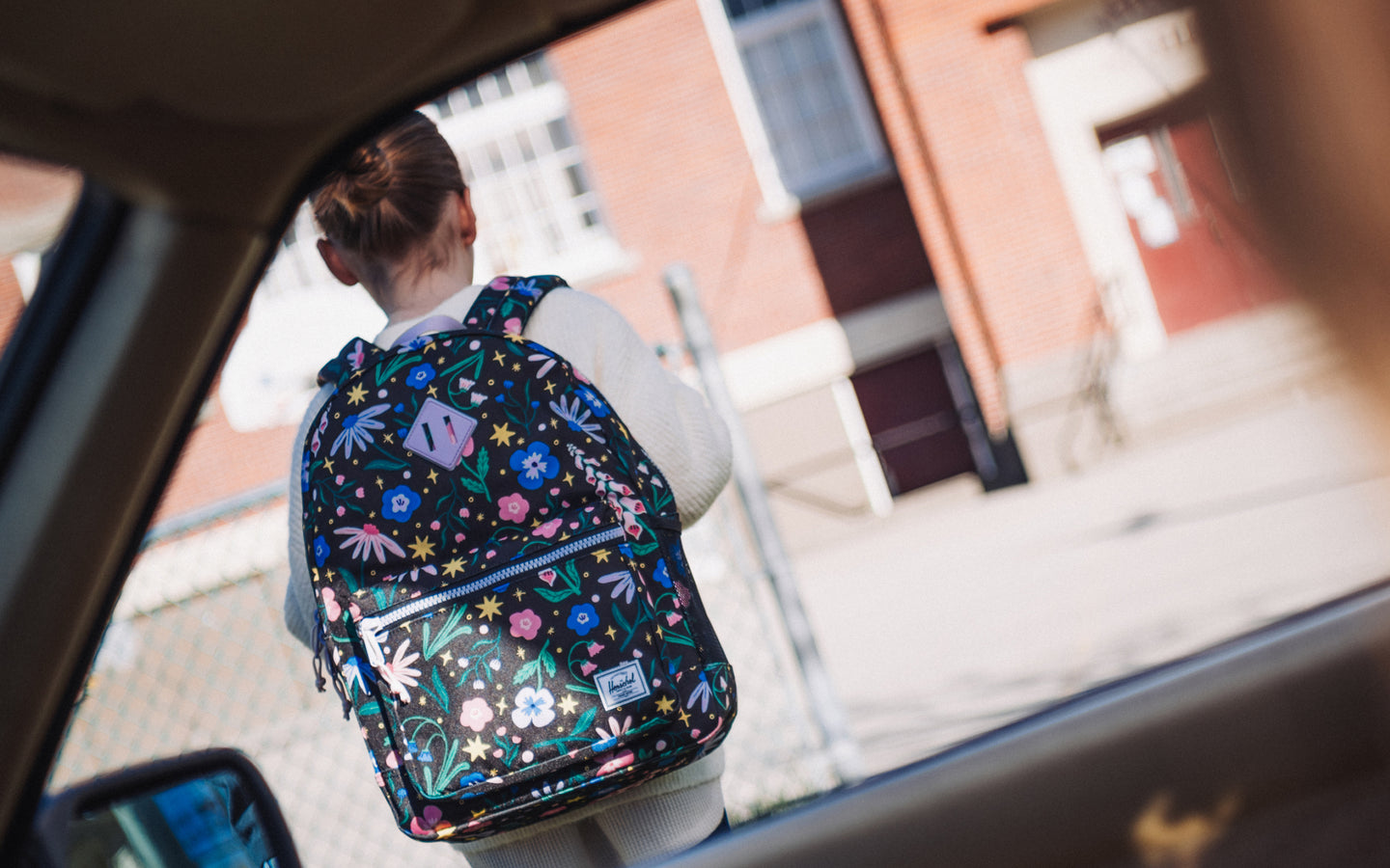 Herschel Heritage Youth Backpack in Enchanted Garden floral print.
