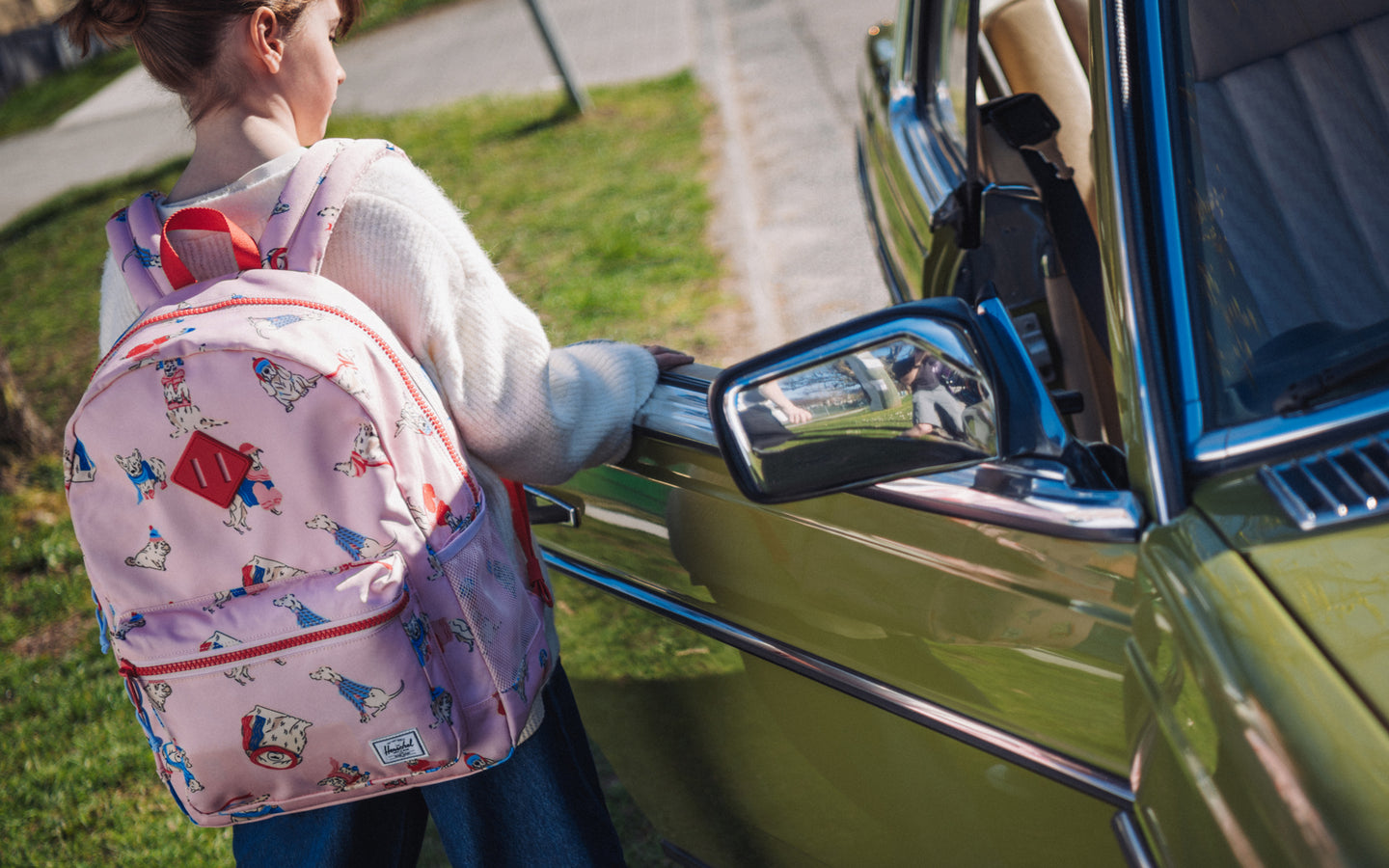 Herschel Heritage Youth Backpack in Fashion Dogs pattern.