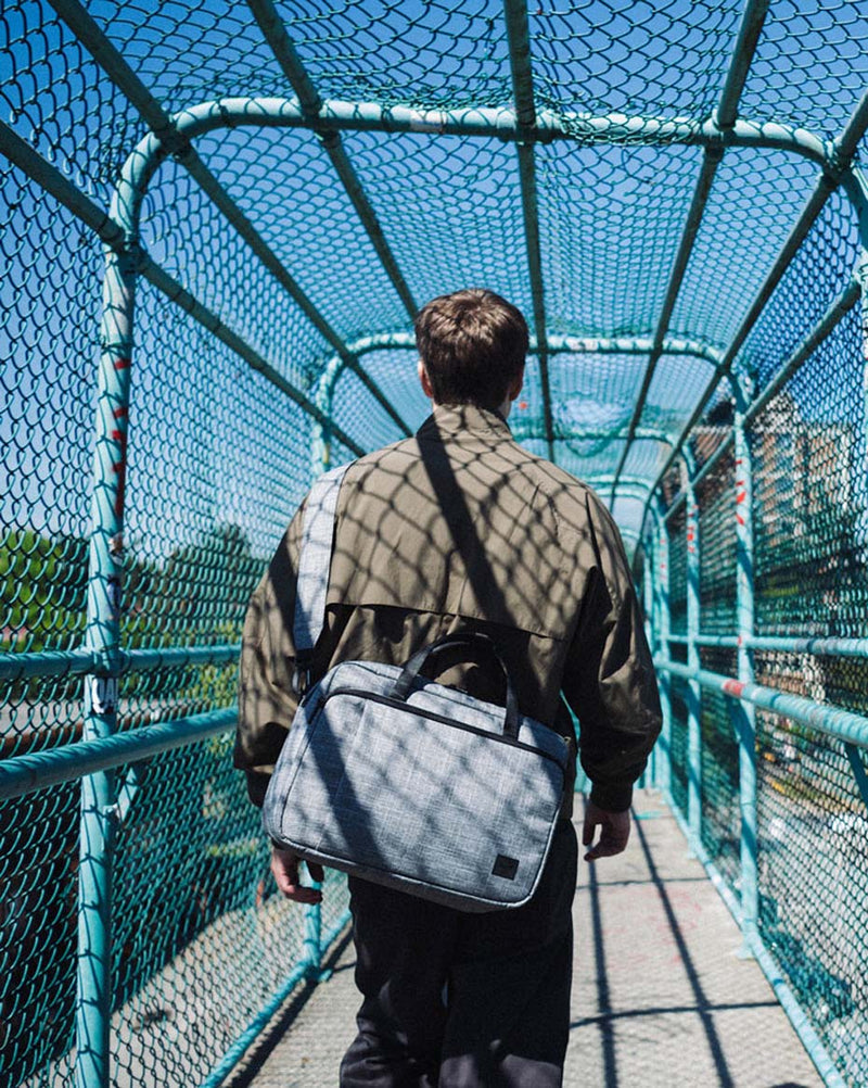 Herschel Supply Co. Gibson Messenger Tech bag in Raven Crosshatch, a professional shoulder laptop bag with top handles.