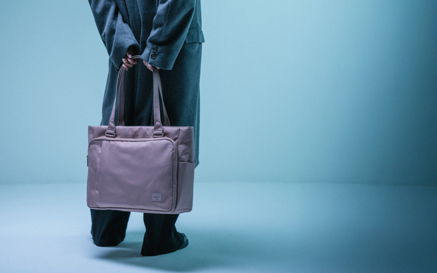 Herschel Supply Co. Kaslo Tote Tech bag in Ash Rose Tonal, showing a clean desktop-ready lifestyle view.